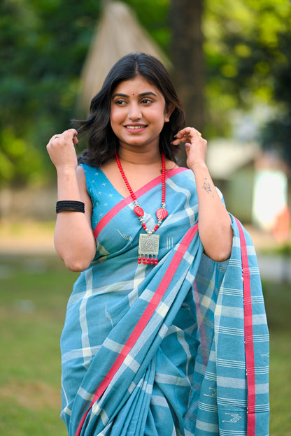 KOMOLINI- Stale blue Cotton Handloom Saree